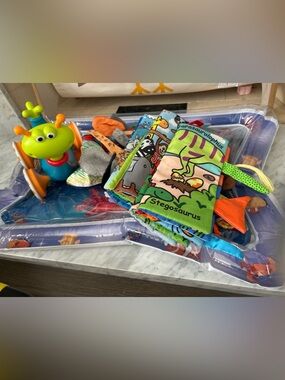 Soft Dino Activity Book and Sensory Teether Toy - Green Multicolor